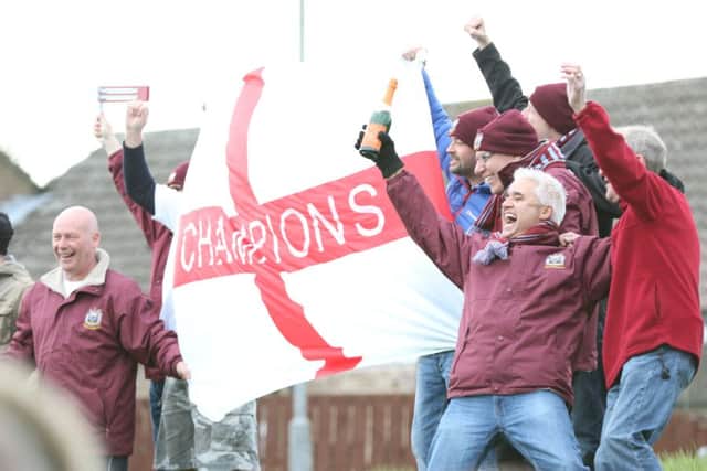 South Shields FC supporters celebrate their title win. Image by Peter Talbot.