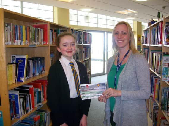 Sharlize Sowden came 2nd in the Key Stage 3 Creative Writing Category  in the national Show Racism the Red Card school competition. With teacher Carla Craig.