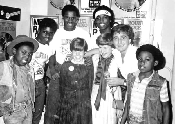 School friends Jacqueline Rowe and Elisabeth Pearson from Jarrow with Musical Youth at the Mayfair Suite in Sunderland.  Also pictured is Paddy MacDee from Metro Radio.