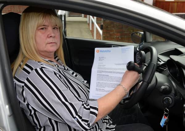 Sandie Coulson is fighting to keep her mobility car through changes in her benefits.