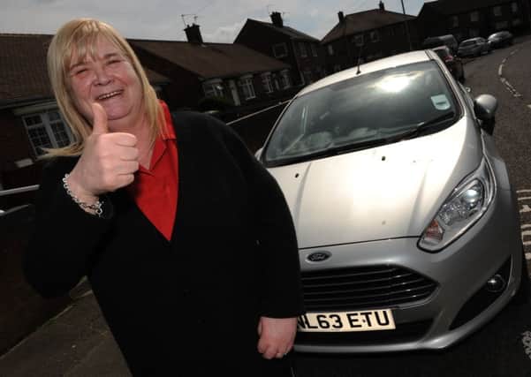Sandie Coulson is delighted that DWP have reviewed her benefits, meaning she can now keep her mobility car.