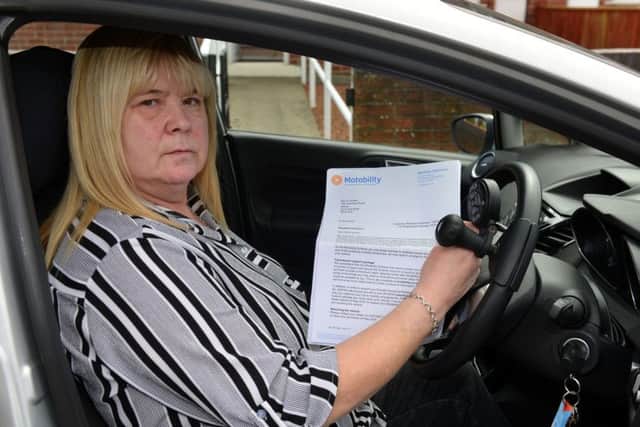 Sandie Coulson is fighting to keep her mobility car through changes in her benefits.