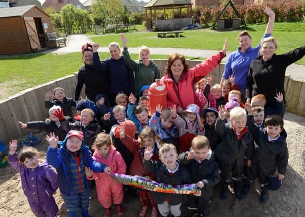 Sue Stokoe, centre, with staff and pupils at Boldon Outdoor Nursery.