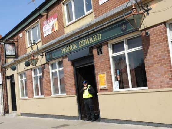 Police officers at the Prince Edward pub, Prince Edward Road, South Shields, where a man had been murdered.