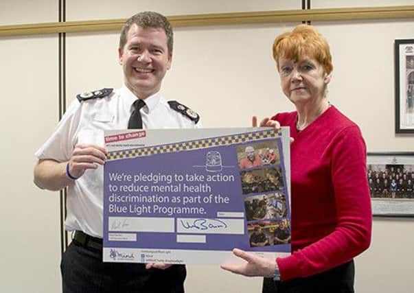 Chief Constable Steve Ashman and PCC Vera Baird with the Blue Light Time to Change Pledge.