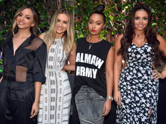 Little Mix (left to right) Jade Thirlwall, Perrie Edwards, Leigh-Anne Pinnock and Jesy Nelson as the group are asking music fans to "stand up" to rip-off ticket touts. Picture from PA.