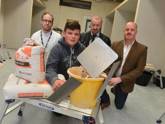 JB Skills are due to star a trade skills courses.
From left Dan Hardy, Keith Reay and Jimmy carr.
Front, trainee Shane Gray