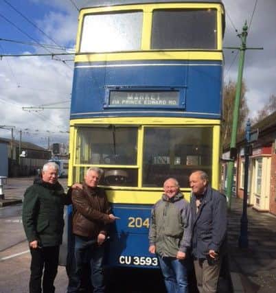 Pictured with the renovated No. 204 trolley bus are, from left, Keith Black, Alan Newham, Ken Hardy and Ivan Marshal.