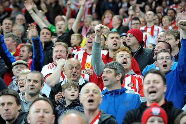 Sunderland fans celebrate at the final whistle