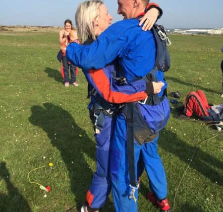 Justin Newby got down on one knee to propose to Karen Henderson after they each completed a skydive at Peterlee Parachute Drop Zone.