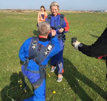 Justin Newby got down on one knee to propose to Karen Henderson after they each completed a skydive at Peterlee Parachute Drop Zone.