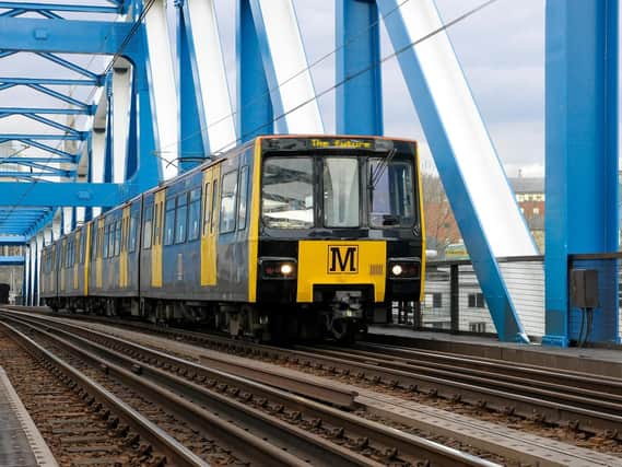 Motorists are being warned to expect traffic delays after an crane hit a Metro bridge near the Tyne Tunnel earlier today.