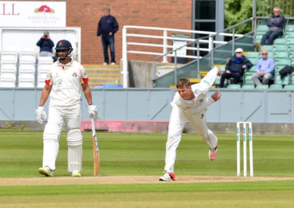 Brydon Carse on his way to a three-wicket haul for Durham today