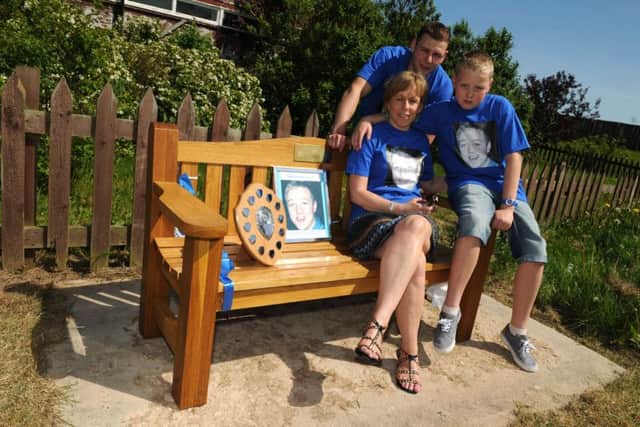 The first Aaron Todd Memorial Shield football match between Jarrow FC and Robertson Scaffolding - Aaron's mum Karen Rutter and borthers Ronnie and Peter, centre