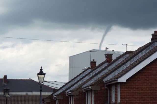 The funnel cloud which was photographed by Kenny Day.
