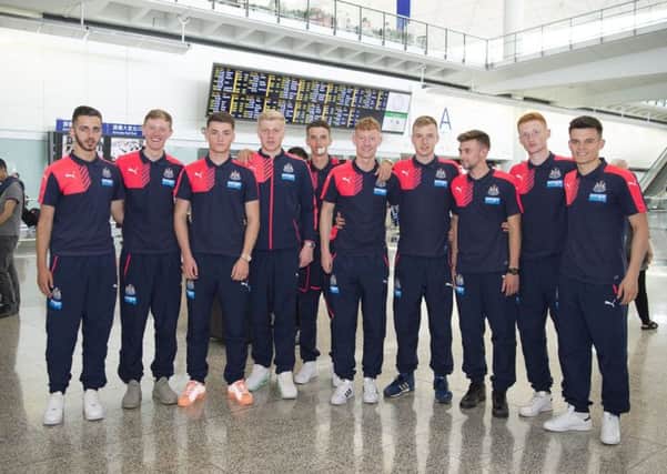 Newcastle's players arrive in Hong Kong