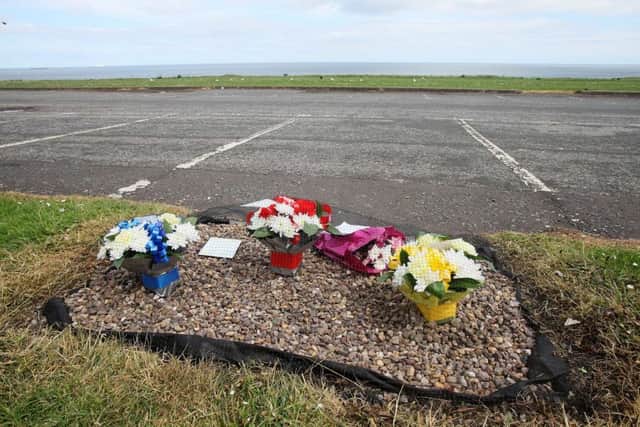 REMEMBERED: Flowers at the Marsden Lea car park in memory of  David 'Noddy' Rice Picture: DAVID WOOD