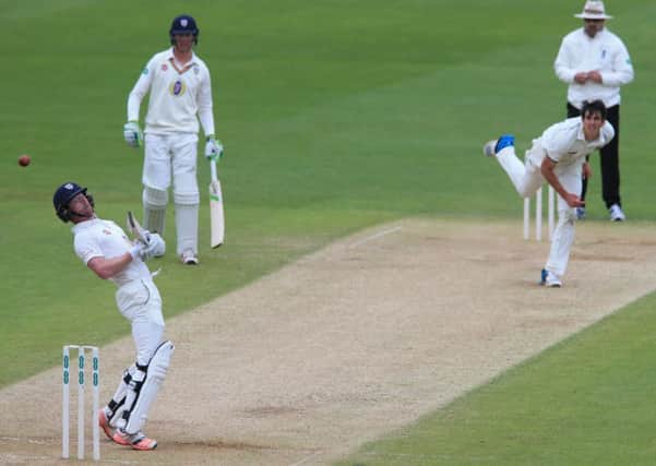 Durham batsman Paul Collingwood ducks away from a bouncer from  Warwickshire's Chris Wright at Edgbaston