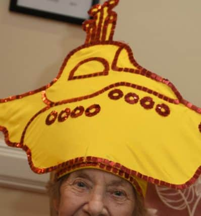 Audrey Dennis at Cheviot Court care home gets into the carnival spirit with a visit from Creative Seed and their dazzling dancers.