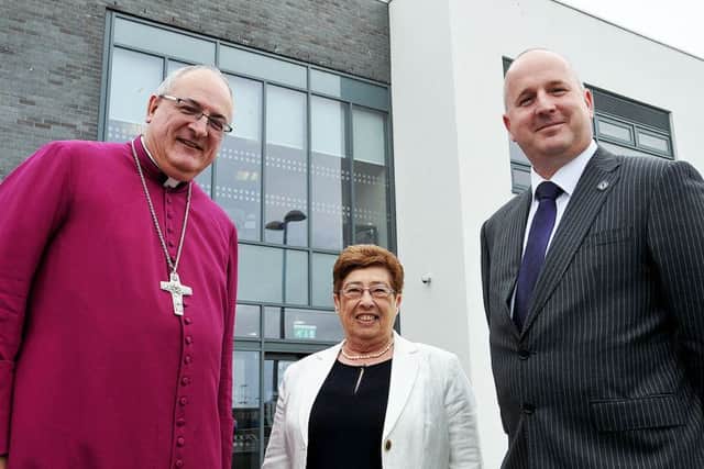Bishop Stephen Conway is welcomed to Whitburn C of E Academy 6th form college by Chair of Governors Jean Mulley and Principle Alan Hardie.
