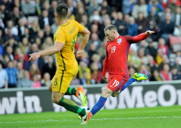 Wayne Rooney slams home to make it 2-0 for England. Picture by Frank Reid