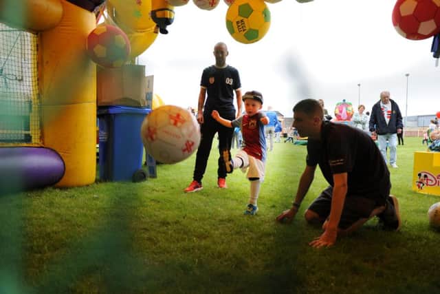 Youngster Rylan Harrison shoots for goal at South Shields FC's fun day.