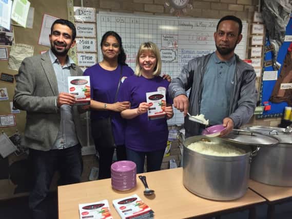 Masum Chowdhury, left, with Friends of Hadrian Farzana Khan and Lisa Smith and Aklasur Rahman, owner of Rice and Spice.