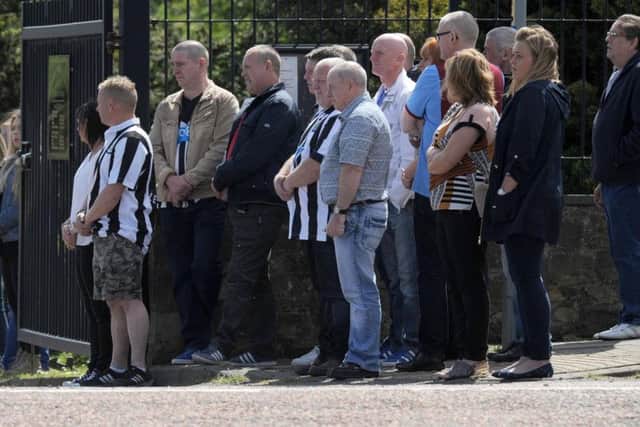 Huge crowds dressed in the famous black and white of Ronnie Howard's beloved Newcastle United turned out to honour his life.