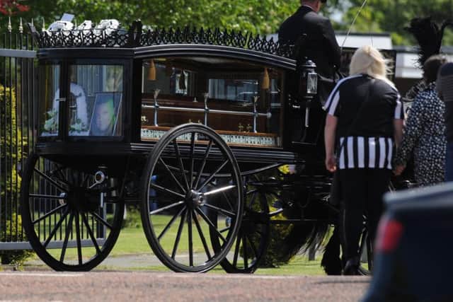 A poignant procession was led into South Shields Crematorium to the strains of St James' Park anthem Local Hero.