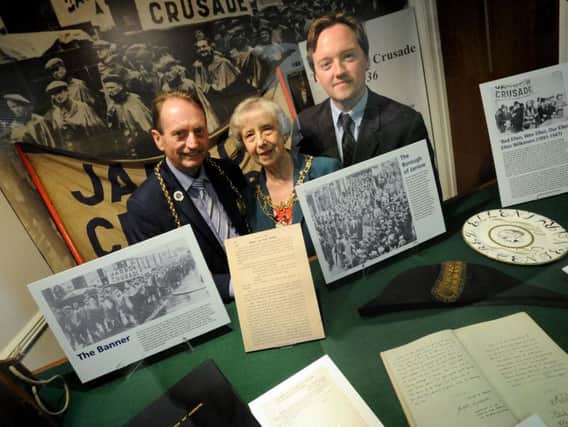 The Mayor and Mayoress, Cllrs Alan and Moira Smith, join Adam Bell at the exhibition