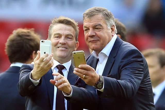 Sam Allardyce poses for a selfie on the pitch with Bradley Walsh before the Soccer Aid match.