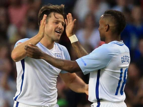 Mark Wright and Jermain Defoe celebrate a goal in the Soccer Aid game. Could they pair up again at Sunderland?
