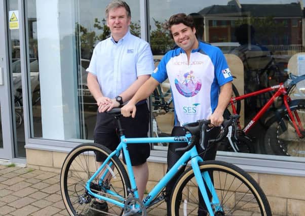 Wayne Foreman of Way Forward Cycles is donating a bike to Joe McElderry for his charity ride.