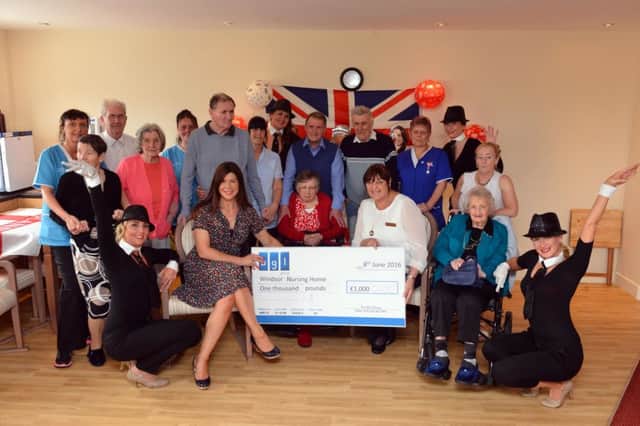 Finance firm BGL Group have donated funds to Windsor Care Home. Front from left BGL Group Andrea Oleski and home manager Andrea Rowe with residents