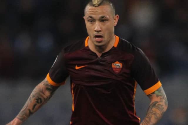 The winner of our worst hair in the Euros award, Radja Nainggolan lining up for club side Roma. Pic: Shutterstock.