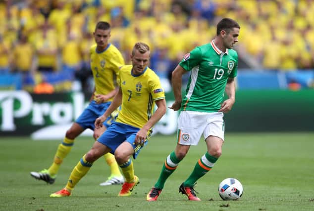 Robbie Brady, right, with Seb Larsson