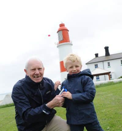 Mel Aynsley and grandson Toby Leggett flying high at Souter Lighthouse