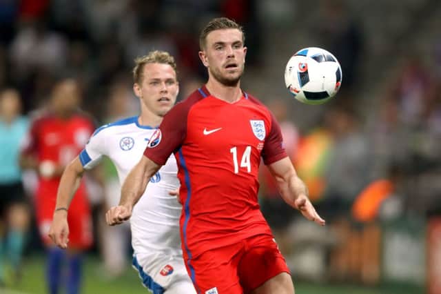 Jordan Henderson in action for England tonight