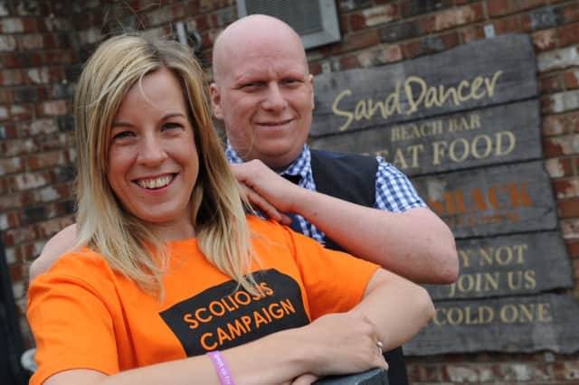 Caroline Nicholson with Ed Hilton, of the Sand Dancer, where the charity event will be held.