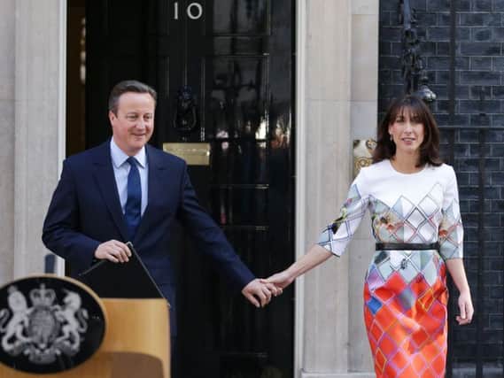 David Cameron and wife Samantha outside Downing Street earlier today.