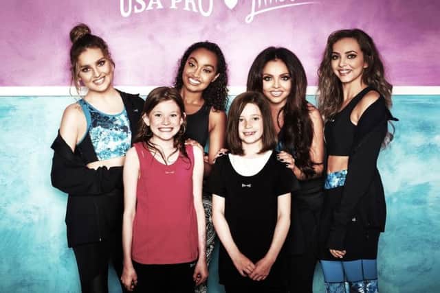 Little Mix with fans at the USA Pro photoshoot.
