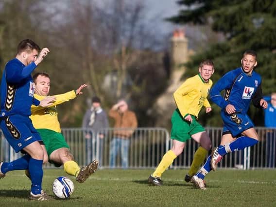 Ben Cattenach and Dwight Gayle, right, when Stanstead took on Dunston