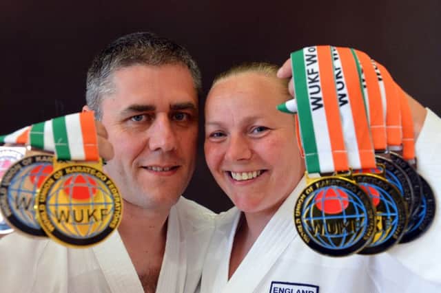 Brian Hall and Hayley Just won eight medals between them at the World Union of Karate-Do Federations World Championships.
