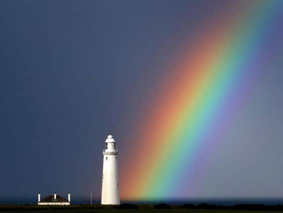 A rainbow at St Mary's lighthouse at Whitley Bay. Picture by PA.
