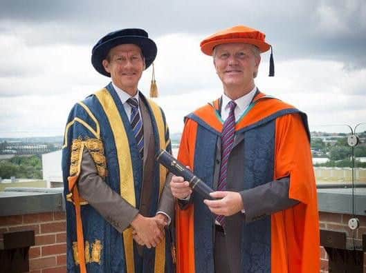 Sir Ken Gibson right with chancellor Steve Cram