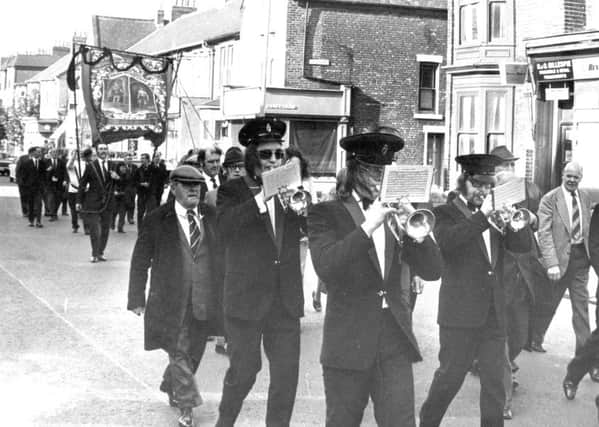Bandsmen leading Westoe miners from their assembly point at the Armstrong Hall, South Shields, as they leave for the 1974 Durham Miners' Gala.