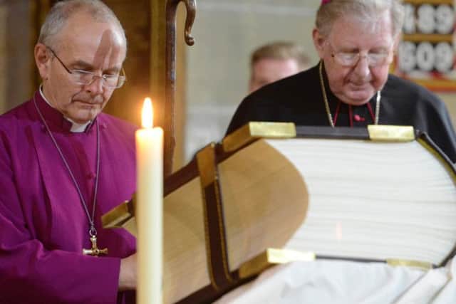 Bishop of Jarrow, the Rt Revd Mark Bryant and Bishop of Hexham and Newcastle the Rt Revd Seamus Cunningha blessing the Codex Amiatinus facsimile.