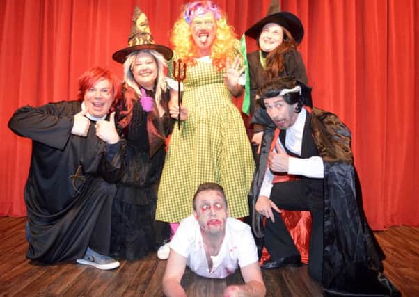 Bob Stott, centre, with the Laffalang Gang during their Halloween show.