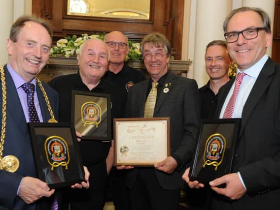 The Mayor of South Tyneside pictured with members of the South Shields Volunteer Life Brigade, Knapp Daneben's Wolfgang Mohrhenn and the Mayor of Wuppertal holding mementoes presented to the brigade to mark their 150th anniversary.