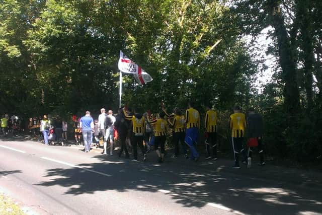 Whitburn and Cleadon junior Football Club marching in Whitburn today to protest over proposals to build houses on the playing fields they use.